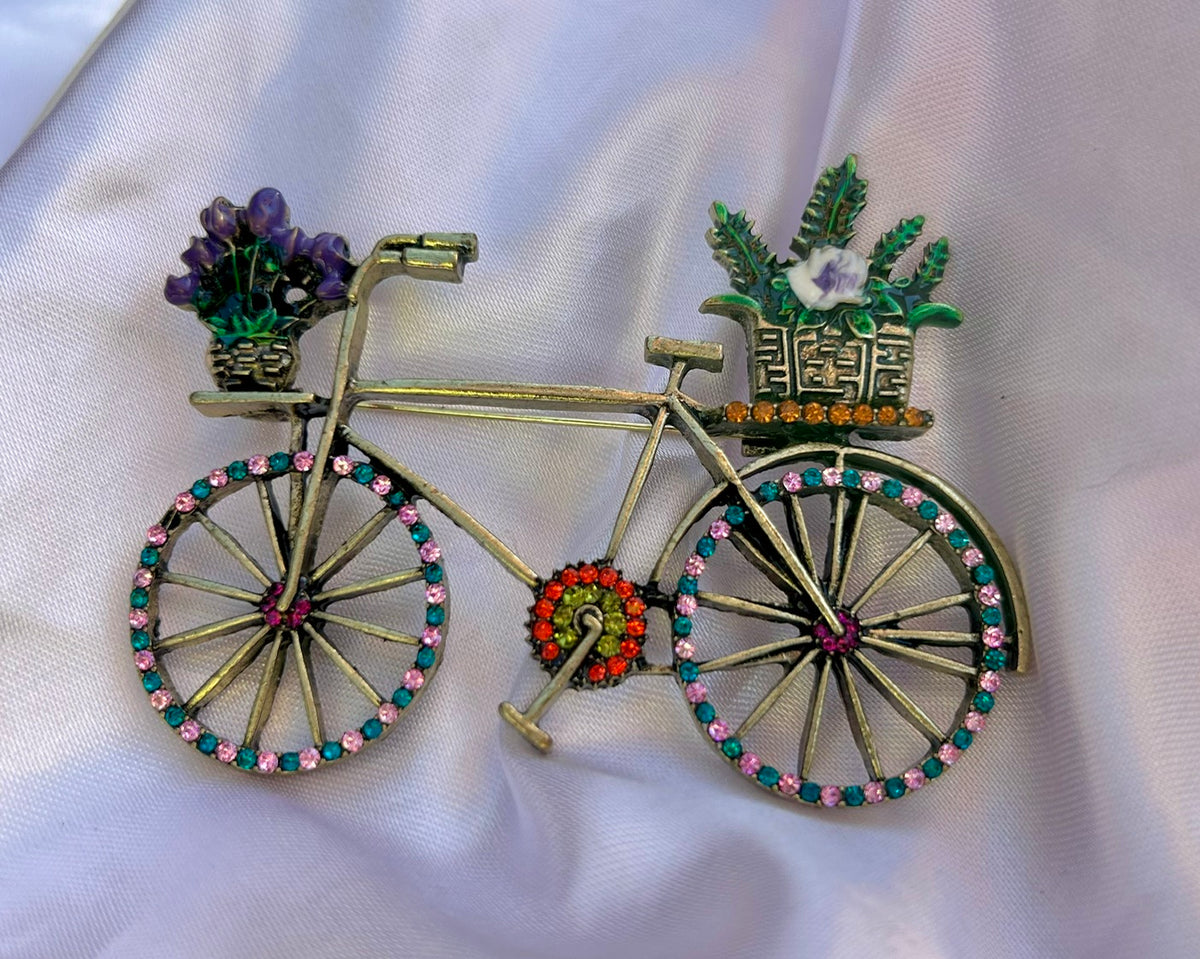 Brošňa bicykel s košíkom